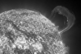 What type of solar activity is shown in the image below?   A)  solar flare B)  solar prominence C)  coronal mass ejection D)  coronal hole