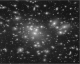 If an astronomer looked at the field shown in the image below with an X-ray telescope,what would he or she see?   A)  small blobs of high-temperature emission around each of the large galaxies B)  a few bright point-like emitters C)  a large, high-temperature-emitting region spanning all the galaxies D)  no significant emission