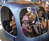 A nurse is observing children at play.Which figure depicts associative play? A)     B)     C)     D)    