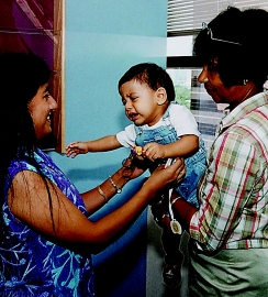 A nurse is admitting a toddler to the hospital.The parent needs to leave for a brief period.Which figure depicts the reaction the nurse expects from the child? A)     B)     C)     D)    