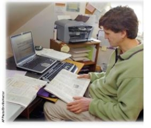 The man in this photograph regularly works from home inorder to avoid a long commute. His office uses video conferencing, instant messaging, and other communication technology to stay connected. Researchers have found thatsuch telecommuting:   A) results in lower job satisfaction and lower income levels. B) has predominantly negative effects for both employees and employers. C) dramatically lowers productivity because teleworkers get distracted by household duties and tend to take too many breaks. D) results in higher job satisfaction, higher employee morale, greater employee autonomy, and improved supervisor/employee relations.