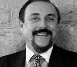 Who is this person and for what is he famous?   A) psychologist Stanley Milgram, who studied the factors that influence destructive obedience B) psychologist Philip Zimbardo who is known for his research on social influence and the Stanford Prison Experiment C) Answ psychoer ) Cologirrecst Solt omon Asch, who is best known for his pioneering studies of conformity D) psychologist Muzafer Sherif, who conducted the famous Robbers Cave experiment