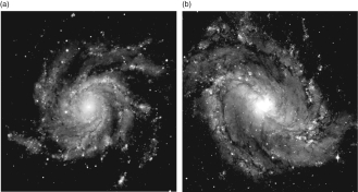 Which of these galaxies is most like our own, and what is the name for the type of the galaxy we live in?   A)  Galaxy A; giant elliptical B)  Galaxy A: nonbarred spiral C)  Galaxy B: barred spiral D)  Galaxy B: irregular E)  Galaxy B: lenticular