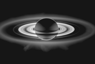 Explain how pictures such as the one shown below are taken. Where must the camera be in relation to the planet and the Sun? Why do the rings appear so bright from this direction?  