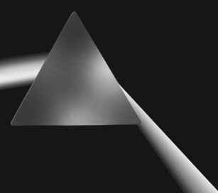 Which of the following phenomena is shown in the figure below?   A)  reflection B)  refraction C)  magnification D)  diffraction E)  interference