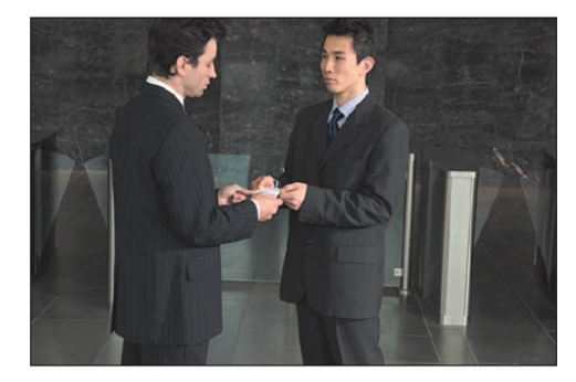FIGURE 17-4   -As shown in the photo in Figure 17-4 above, exchanging business cards in Asia is done according to the customs and norms of the country or region.This protocol is considered important during which stage of the personal selling process? A) presentation B) approach C) follow-up D) preapproach E) close
