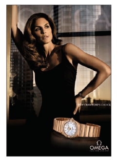 FIGURE 5-12   -When OMEGA Watches use spokespeople like Cindy Crawford shown in Figure 5-12 above, it believes she is a(n)  __________ who can influence the purchase decision of its target market. A) spokesperson B) champion C) opinion leader D) baby boomer E) caveat emptor