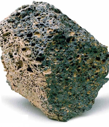   What caused the many small holes that are seen in this sample of scoria? A) impacts by volcanic bombs B) dissolving away of minerals C) degassing of volatiles D) raindrops