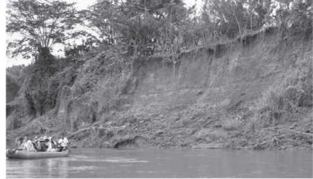 The image below shows a cut bank along a river that was formed by a   A) lahar. B) rock fall. C) slump. D) debris slide.
