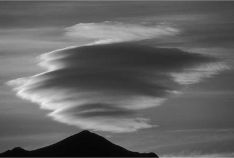 What type of clouds are shown in the figure below?   A) cumulonimbus B) stratus C) lenticular clouds D) altostratus