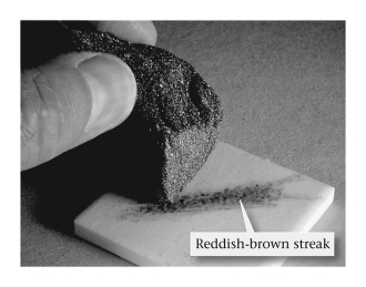 <strong>For the majority of minerals,the streak color obtained when the mineral is scratched against a porcelain plate is ____________. </strong> A) likely to be diagnostic only if the mineral is hard enough to scratch porcelain B) more variable than the color in a hand sample among crystals C) less variable than the color in a hand sample among crystals D) always dark brown or black