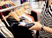 <strong> The accompanying figure shows a portable ____ reader.</strong> A)barcode B)scanner C)RFID D)optimal mark