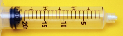 What is the lowest measurable dose on the 20-mL syringe?   