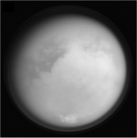 Titan's thick atmosphere (see the image below) is believed to have been created when ultraviolet photons broke apart methane molecules,ultimately creating the observed smog-like conditions.This process,though,would likely remove all of the atmospheric methane in roughly 10 million years,yet we still see its presence today.How can this be?   A)  Cometary impacts periodically bring new methane to Titan. B)  Ethane rains down out of the atmosphere,combines with surface rocks,and creates new methane. C)  Infrared photons give atmospheric molecules enough energy to recombine into methane. D)  Volcanoes on Titan periodically release new methane into the atmosphere.