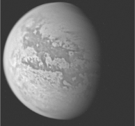 Examine the image below.   Titan is a prime candidate for life outside Earth because it has: A)  liquid water B)  a dense atmosphere like Earth's C)  active volcanoes D)  organic material