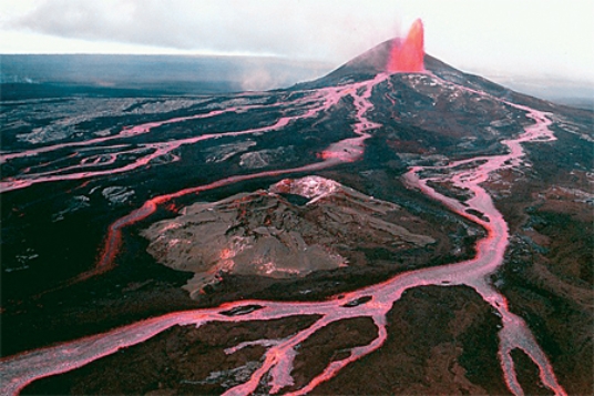 Shield volcanoes are built up primarily by relatively   A) nonexplosive outpourings of lava. B) explosive ash-forming eruptions. C) high-viscosity dome-forming eruptions.