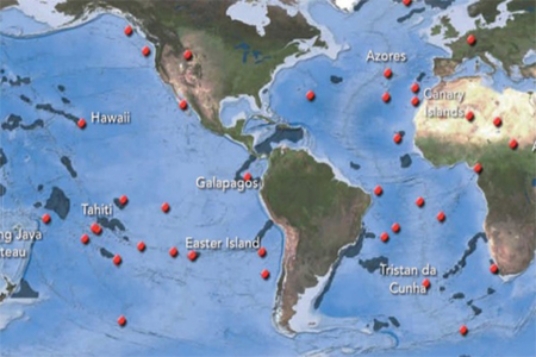 The red dots that coincide with volcanically active island chains shown on the map are called   A) hot spots. B) mid-ocean ridges. C) abyssal plains. D) island arcs.