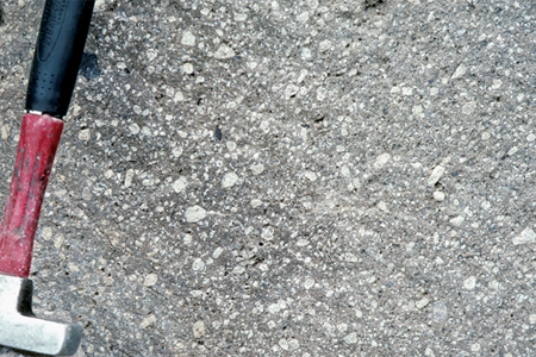 Which of the following rock photographs depicts a felsic igneous rock? A)    B)    C)    D)   