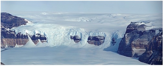 The exposed bedrock in the background of the figure below,to the right,formed as   A) isostatic rebound caused the land to extend upward. B) particularly resistant rock and/or thin ice left the rock above the ice surface. C) a mantle hot spot melted the glacier in this localized area. D) local wind-blown deposition concentrated in this area of the glacier.