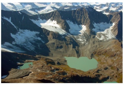 The lakes in the photograph below are all connected by a stream,so they are called   A) cols. B) kames. C) paternoster lakes. D) cirques.