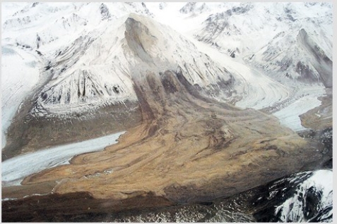 The main feature shown in this photograph illustrates   A) weathering. B) flooding. C) permafrost. D) slope failure.