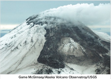 What types of rocks would be most common in the volcano in this photograph?   A) Scoria and other vesicular basalt B) Basalt mostly formed in lava flows C) Felsic and intermediate lava flows D) Pillow basalts E) None of these are correct.