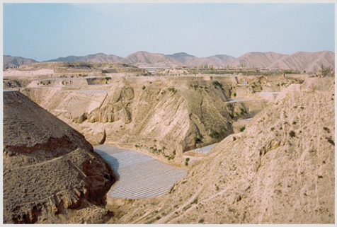 This wind-blown dust deposit (loess) from Tibet   A) was deposited by a huge flood of seawater that covered the land at the time of the dinosaurs. B) began as clay and silt that were produced by grinding of rocks along ice-age glaciers. C) forms a worldwide layer associated with a well-known extinction of dinosaurs. D) All of these are correct.