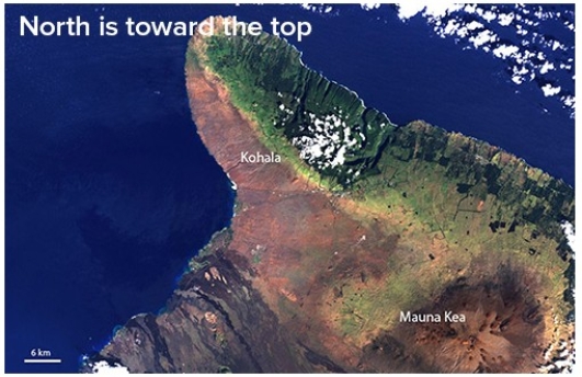 What is the predominant wind direction that results in the rain shadow observed in this picture from one of the Hawaiian Islands?   A) Southwest B) Southeast C) Northwest D) Northeast
