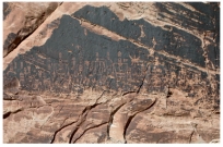 What desert feature is shown in this photograph?   A) alluvial fan B) playa C) caliche D) desert wash E) desert varnish