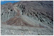 Which of the following landscape features is shown in this photograph?   A) pediment B) playa C) sand dune D) dry wash E) alluvial fan