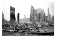 What likely caused much of the damage shown in this photograph in the 1906 San Francisco earthquake?   A) a breakdown in the computerized warning system B) a tsunami C) fires that broke out after the earthquake D) ground ruptures,cracks,and fissures