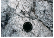 Under what conditions was this rock likely deformed?   A) relatively shallow B) brittle conditions C) conditions that favored fracturing D) all of these