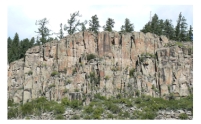 What type of structure is expressed in this cliff face?   A) normal faults B) reverse faults C) joints D) folds