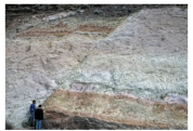 What type of structure is shown in this photograph?   A) joint B) cleavage C) fault D) anticline E) syncline
