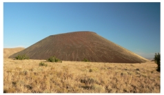This volcano is relatively small and composed of volcanic cinders.What kind of volcano is it?   A) scoria cone B) shield volcano C) composite volcano D) volcanic dome E) caldera