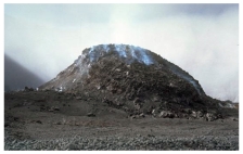 This relatively small volcanic feature consists of solidified lava and some volcanic ash.What kind of volcano is it?   A) scoria cone B) shield volcano C) composite volcano D) caldera E) none of these