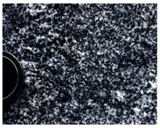 Which of the following photographs depicts an igneous rock where the magma cooled slowly at first and then had fast cooling? A)    B)    C)    D)   