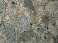 What type of rock is shown in this photograph?   A)  crystalline rock B)  clastic rock C)  rock with minerals that are too small to see D)  none of these