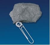 What mineral test is shown in this photograph?   A)  scratch test B)  effervescence C)  streak D)  magnetism E)  specific gravity