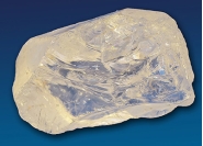 The very common mineral shown in this photograph is light colored, transparent, has a hardness of seven, and fractures rather than cleaves. It does not effervesce. What mineral is it?   A)  garnet B)  quartz C)  biotite D)  muscovite E)  feldspar