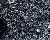 Which of the following rock photographs depicts a felsic igneous rock? A)    B)    C)    D)   