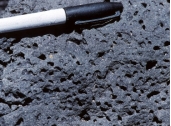 Which of the following rock photographs depicts an igneous rock that trapped gas? A)    B)    C)    D)   