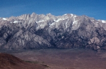 The igneous feature shown in this photograph is:   A)  dike B)  sill C)  volcanic neck D)  batholith