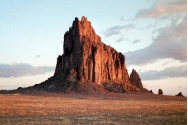The igneous feature shown in this photograph is:   A)  dike B)  sill C)  volcanic neck D)  batholith