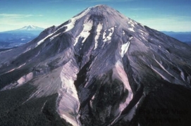 The typical shape of most volcanoes, including the one shown here, is:   A)  conical B)  cylindrical C)  domical