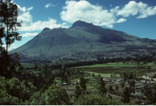 This relatively large, symmetrical volcano contains interlayered lava flow, pyroclastic deposits, and volcanic mudflows. What kind of volcano is it?   A)  scoria cone B)  shield volcano C)  composite volcano D)  volcanic dome E)  fissure