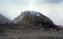 This relatively small volcanic feature consists of solidified lava and some volcanic ash. What kind of volcano is it?   A)  scoria cone B)  shield volcano C)  composite volcano D)  caldera E)  none of these