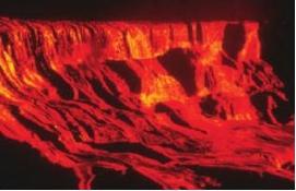 Long, thin lava flows are typically produced by:   A)  volatile-rich eruptions B)  high-viscosity lavas C)  low-viscosity lavas D)  collapsing eruption columns