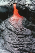 What type of volcanic eruption is probably shown in this photograph?   A)  pyroclastic flow B)  fire fountain C)  basaltic lava flow D)  felsic lava flow E)  caldera eruption