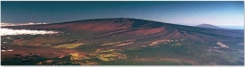 Shield volcanoes have low slopes primarily because:   A)  the low viscosity of basaltic magma allows it to flow downhill for long distances B)  they never erupt from the same place twice C)  their abundant ash layers spread out large distances